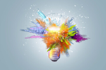 Wall Mural - Creative concept light bulb explodes with colorful water colors on a light blue background. Think different, creative idea. Productivity and creativity