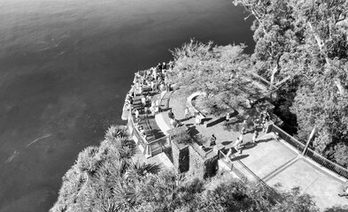 Sticker - Tourists enjoy the viewpoint at Cabo Girao, along the Madeira coastline, Portugal. Aerial view from drone