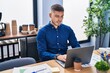 © Krakenimages.com - Young hispanic man business worker using laptop working at office