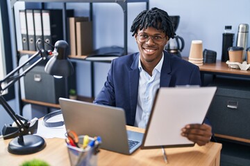 Poster - African american man business worker using laptop reading document working at office