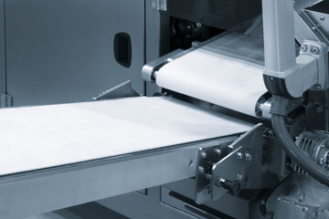 Poster - industrial production of bakery products on an assembly line - technology and machinery in the food factory