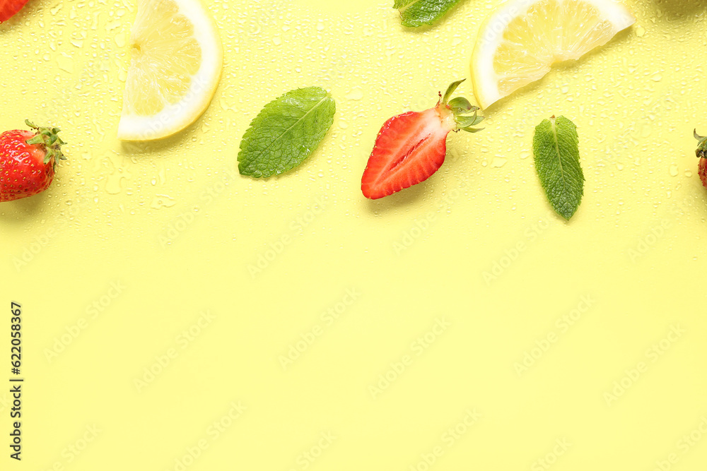 Ingredients for preparing strawberry lemonade on yellow background