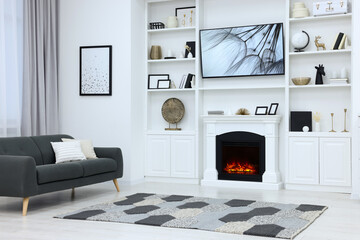 Canvas Print - Stylish room with beautiful fireplace and comfortable sofa. Interior design