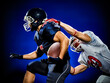 © Designpics - two american football players men isolated on colorful black background