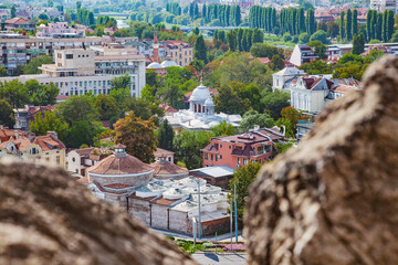 Wall Mural - View of Plovdiv, Bulgaria downtown with old and new buildings and trees along Maritsa river.