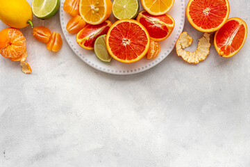 Canvas Print - Many mixed fruits on white plate, top view