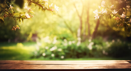 Empty wooden table top, texture board, on a blurred background of an orchard, trees in blurred bokeh
