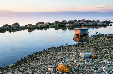 Wall Mural - Beautiful Sunset and fishing boat on the coast