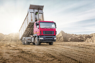 large mining dump truck at the construction site. powerful modern equipment for the delivery and tra