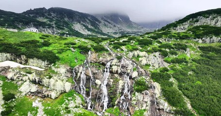 Wall Mural - Rila mountain lakes and waterfall, river nature of Bulgaria 4K video