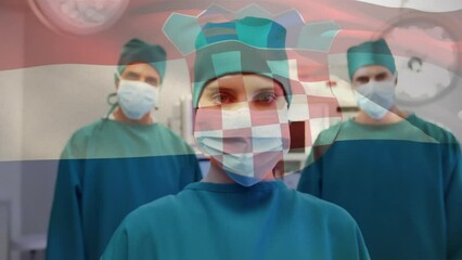 Poster - Animation of waving croatia flag over portrait of diverse surgeons in surgical masks at hospital