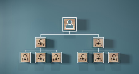Wall Mural - company hierarchical organizational chart of wooden cubes on blue background. human resources manage