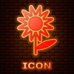 Wall Mural - Glowing neon Sunflower icon isolated on brick wall background. Vector