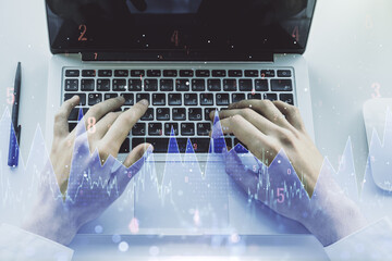Fototapete - Abstract creative stats data concept with hands typing on laptop on background. Multiexposure