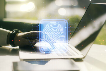 Aufkleber - Abstract creative fingerprint concept with hands typing on laptop on background. Multiexposure