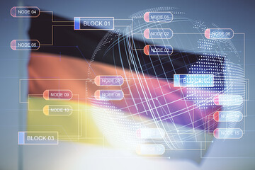 Poster - Abstract virtual coding concept and world map hologram on flag of Germany and sunset sky background. Multiexposure