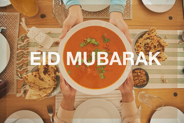 Wall Mural - Food, Eid Mubarak and soup for family at table for Islamic celebration, festival and lunch together. Ramadan, religion and above of hands with meal, dish and cuisine for fasting, holiday and culture