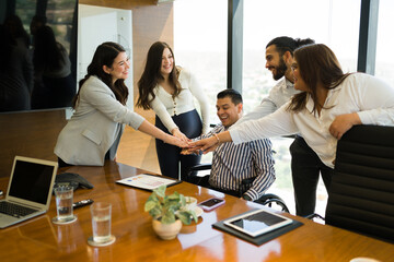 Wall Mural - Group of businesspeople working together as a team