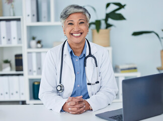 Canvas Print - Doctor, portrait and woman in healthcare office for consultation, support and services, planning or advice. Happy face of medical worker or senior person for health insurance in clinic or hospital