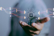 © Kanokpol - focus hand of businessman show virtual graphic data connect with AI.Using AI to sucess everything, Futuristic data technology.