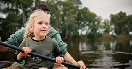 Wall Mural - Girl, mother and pointing in kayak on river on holiday, vacation and travel together. Happy mom, child on boat and gesture for sightseeing, bonding at lake and exercise for family adventure outdoor.