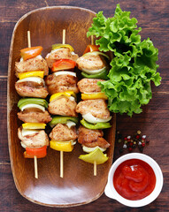 Wall Mural - chicken kebab with onions and bell peppers