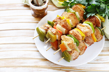 Wall Mural - chicken kebab with onions and bell peppers