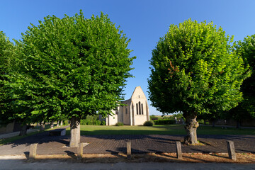 Canvas Print -  Saint-Ubin church in Yèvre-Le-Châtel old village in Centre-Val-De-Loire region