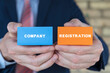 © wladimir1804 - Businessman holding colorful blocks with inscription: COMPANY REGISTRATION. New company registration concept. Business start up. Brand and identity building process. Company formation procedure.