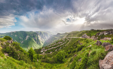 Sticker - Beautiful landscape with green mountains and magnificent cloudy sky in sunset. Exploring Armenia