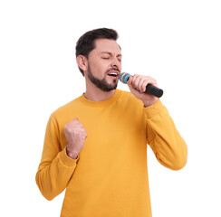 Wall Mural - Handsome man with microphone singing on white background