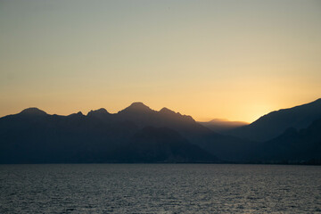 Wall Mural - Mountain, sea and sunset views. Beautiful nature, enjoyment, relaxation, sense of tranquility.