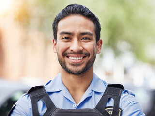 Portrait of man, security guard or smile of safety officer for protection service or patrol in city. Law enforcement, professional crime prevention or face of happy asian policeman in uniform outdoor