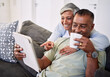 Home, tablet and happy senior couple on sofa, relax and check email, news article and point at online shopping choice. Website info, decision or elderly man, old woman or people smile in living room