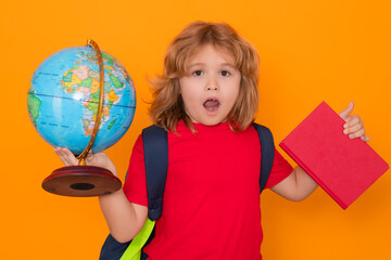 Aufkleber - Back to school. Isolated portrait of cute child school boy. School and education kids concept. Clever school boy on yellow studio background.