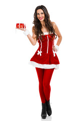 Sticker - Beautiful and sexy Santa girl holding a christmas gift