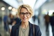 © pham - A short blonde hair businesswoman with glasses is smiling, created with Generative Ai Technology