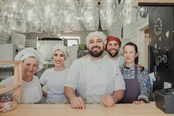 Friendly team work of a pizzeria restaurant