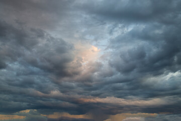 Wall Mural - storm clouds.background of the summer sky with thunderclouds.