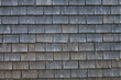© KilmerMedia - Closeup detail of old wood shingles on the roof of a house in Switzerland is shown.