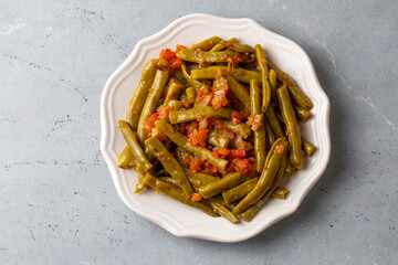 Wall Mural - Traditional delicious Turkish food; Green beans with olive oil; Turkish name; Zeytinyagli taze fasulye