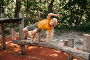 girl doing parkour in a park