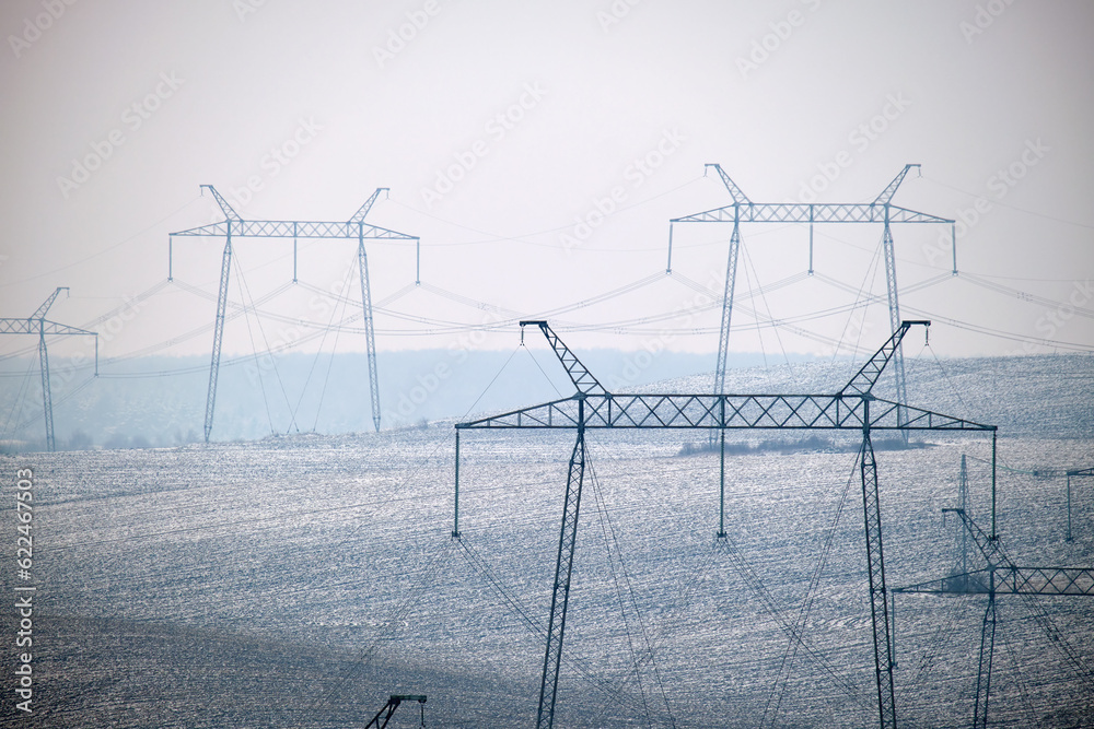 High voltage tower with electric power lines transfening electrical ...