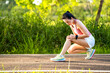 © mnirat - Asian  woman accident falling down on floor in the park while running exercise with knee pain