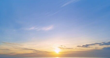 Wall Mural - Colorful clouds over sea background,Beautiful 4K Time lapse of Majestic sunset clouds sky landscape,Amazing light of nature cloudscape sunset or sunrise sky