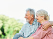 © Lumos sp - woman man senior couple happy retirement together elderly hug active bonding park outdoor sitting bench leisure fun smiling love old nature wife happiness mature