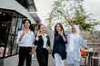 © Odua Images - Group of cheerful young businesspeople wearing casual clothes with okay hand gestures standing in a coworking space