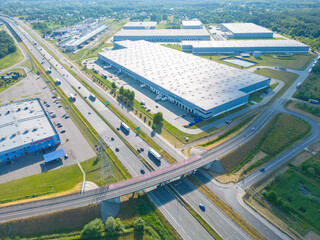 Sticker - Logistics park with warehouse. Semi-trailers trucks standing on car parking and waiting for loading and unloading goods at ramps. Aerial view