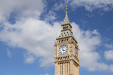 Fototapeta Big Ben - Big Ben Clock Tower in London, UK in a day with white clouds and blue sky.