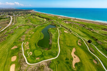 Aerial View Of Golf Course Next To The Beach On The Mediterranean Sea Coast Of Belek, Antalya, Turkey.